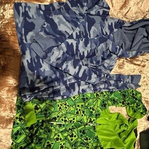 Blue Camouflage Onesie Hoodie (size 10) and Green Graphic Hoodie(large).